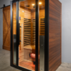 MIRNA 2-PERSON SAUNA_2 Mirna 2 person infrared sauna showcasing the red cedar exterior, titanium frame and red light tube