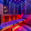 VATRA 3-4 PERSON SAUNA interior with chromotheraphy lights, dual tier seating and red light tubes